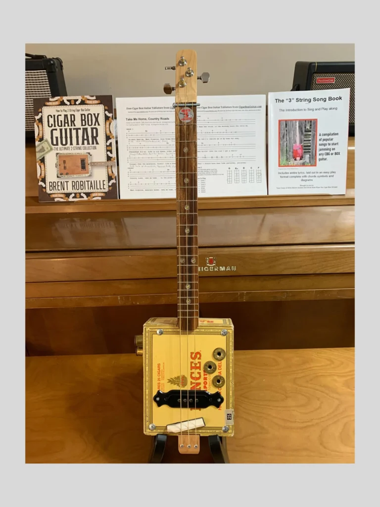 front view of bances cigar box guitar by bob's 3-stringers