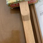 Back view of the top of the Romeo Y Julieta cigar box guitar, where the neck attaches to the body.