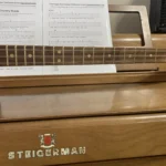 Close-up view of neck and fretboard of #43 - Fat Bottom Betty cbg by Bob's 3 Stringers