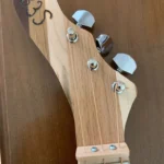 Front view of 3 string guitar with wooden headstock handcrafted by Bob 3 Stinger.