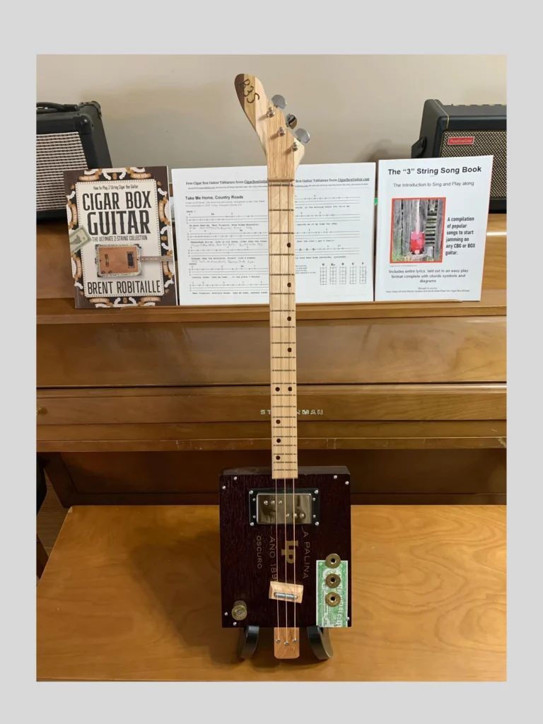 Front, vertical view of la palina cigar box guitar by Bob's 3-Stringers