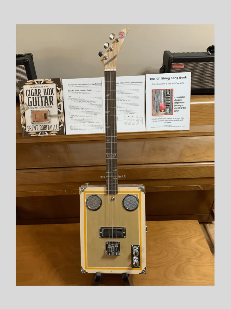 Front, vertical view of Craft/Stripped cigar box guitar by Bob's 3-Stringers