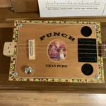 Front view of the Punch cigar box guitar handcrafted by Bob.