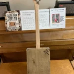 Back, vertical view of Craft/Stripped cigar box guitar by Bob's 3-Stringers