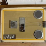Front view of the Craft/Stripped cigar box guitar handcrafted by Bob.