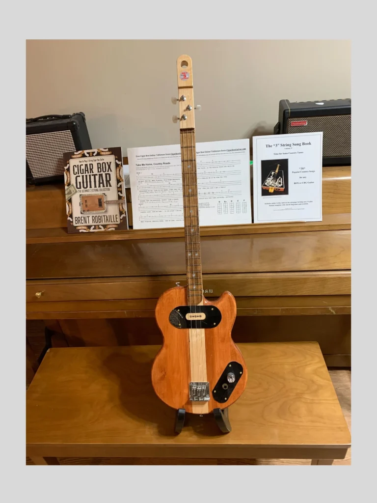 Front, vertical view of 2 Solid Body Guitar