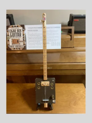 Front, vertical view of #35 macanudo diddley bow cigar box guitar by bob's 3-stringers