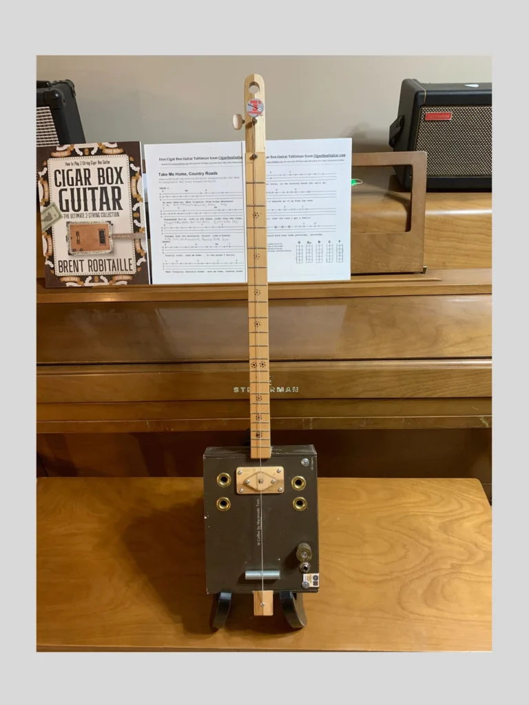 Front, vertical view of #35 Macanudo Diddley Bow cigar box guitar by Bob's 3-Stringers