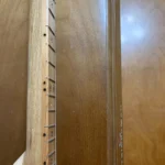Side view of the Burned in side fret markers of the Macanudo Diddley Bow cigar box guitar handcrafted by Bob.
