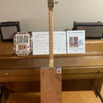 Back , vertical view of Fretless Bass cigar box guitar by Bob's 3-Stringers