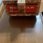 close up of the bottom of the Bolivar Diddley Bow cigar box guitar