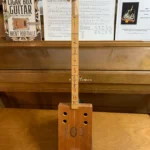 Front, vertical view of Alfred Dunhill Diddley Bow cigar box guitar by Bob's 3-Stringers