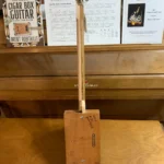 Back, vertical view of Alfred Dunhill Diddley Bow, cigar box guitar by Bob's 3-Stringers