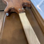Close-up of the gloss finish on the neck of Solid Body Guitar handcrafted by Bob.