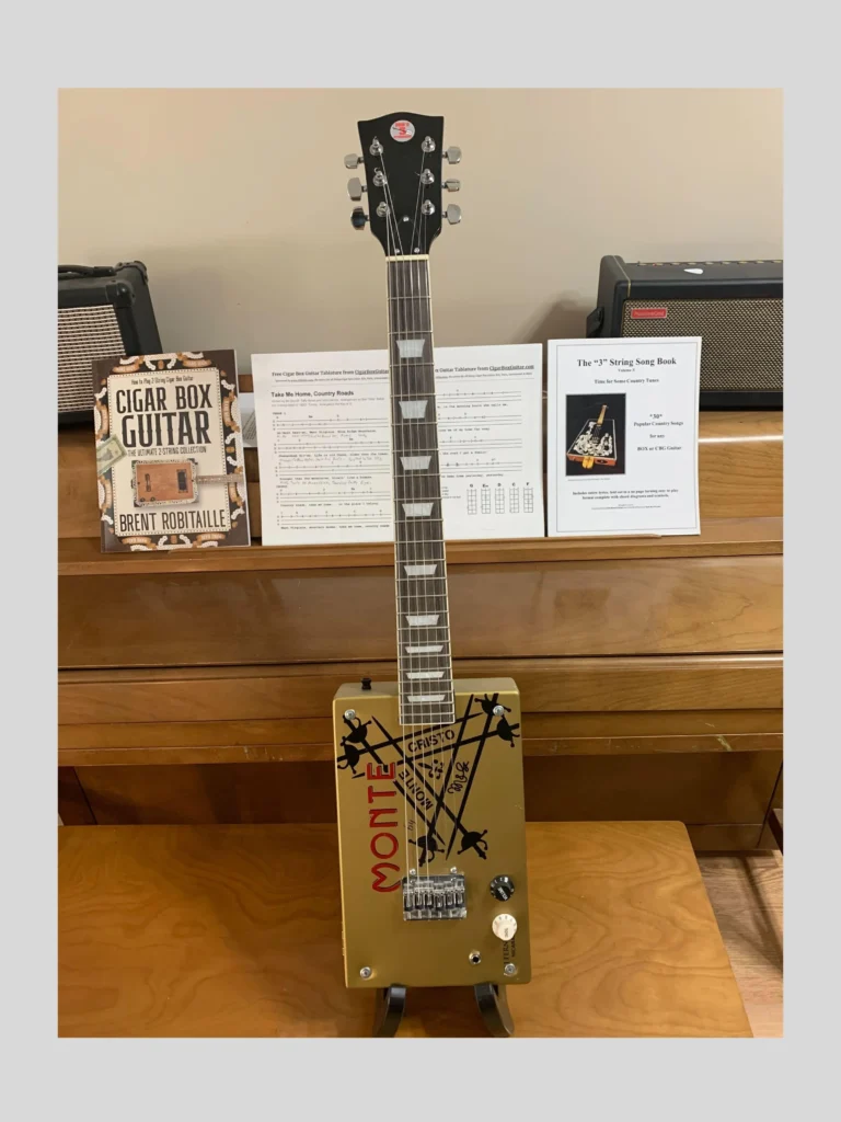 Front, vertical view of Monte Cristo cigar box guitar by Bob's 3-Stringers