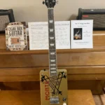 Front, vertical view of Monte Cristo cigar box guitar by Bob's 3-Stringers