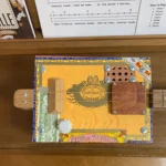 Front view of the Partagas cigar box guitar handcrafted by Bob.