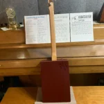 Back, vertical view of #62 Wild Raspberry Box Guitar by Bob's 3-Stringers