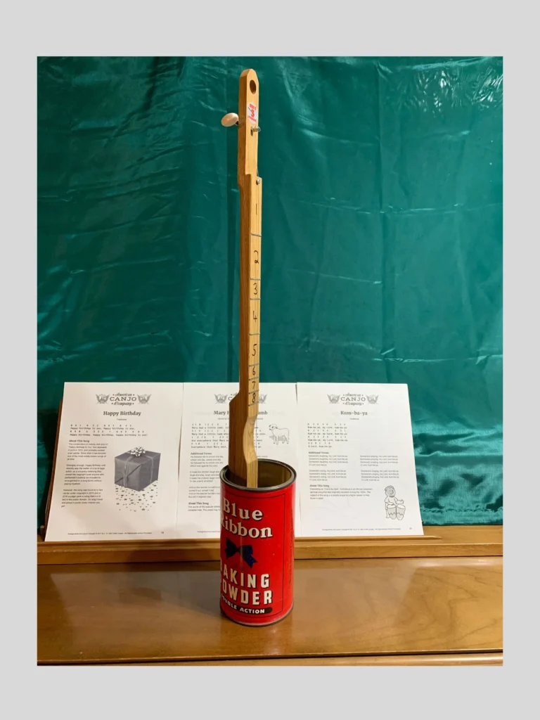Front vertical view of the Blue Ribbon Canjo by Bob's 3-Stringers.