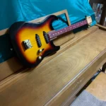 Side view of the whole body of the #3 Solid Body Guitar handcrafted by Bob.