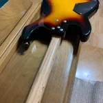 Closed Up back of 3 Solid Body Guitar with Gloss finish on neck,