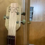 Closed Up view of #3 Solid Body Guitar with 3 Antique Brass closed gear tuners , Laminated oak headstock , by Bob