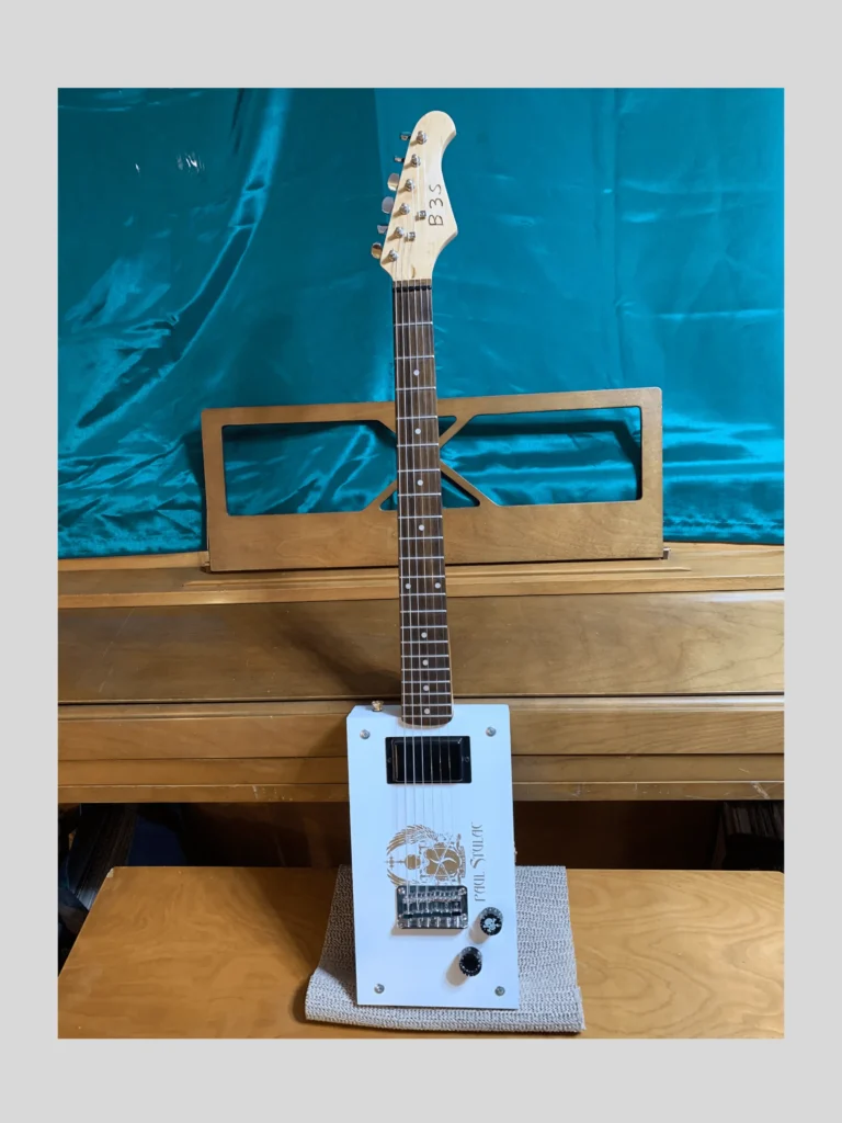 Front, vertical view of 6 String guitar by Bob's 3-Stringers