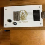 Close-up bottom view of the 6 String Guitar , a cigar box guitar handcrafted by Bob