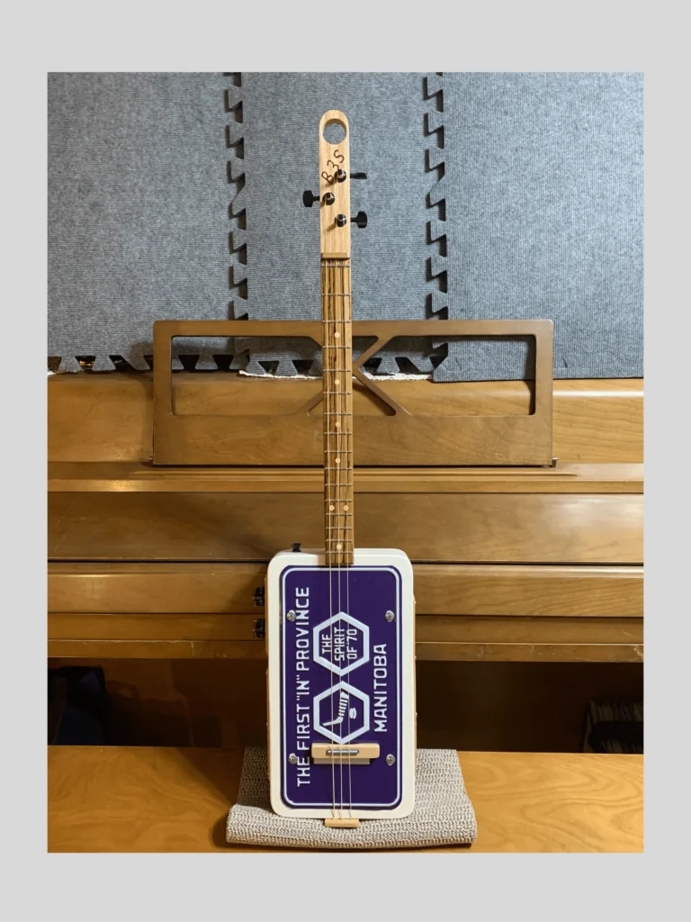 Front, vertical view of License Plate Guitar #71 by Bob's 3-Stringers