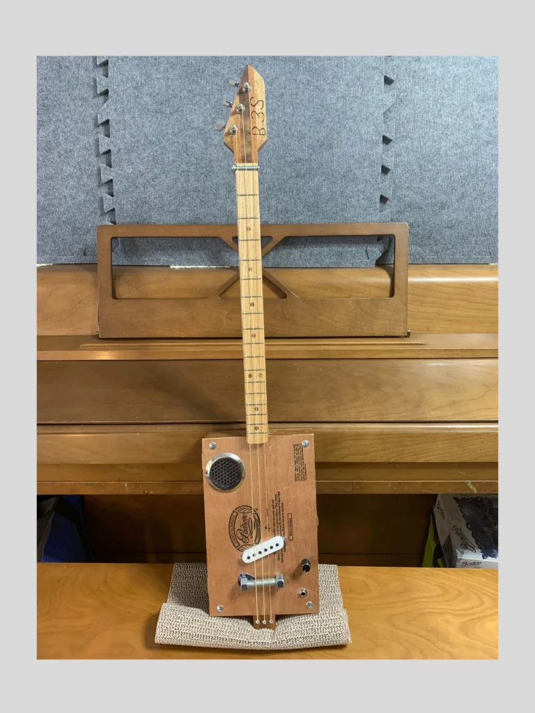 Front, vertical view of #77 Padron3 String Cigar Box Guitar by Bob's 3-Stringers
